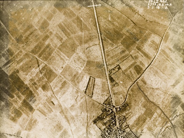 Aerial view of a bomb-damaged village. One of a series of British aerial reconnaissance photographs