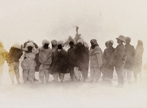 A line of 'zamindars'. Sir Henry Staveley Lawrence, Collector of Karachi, stands beside a line of