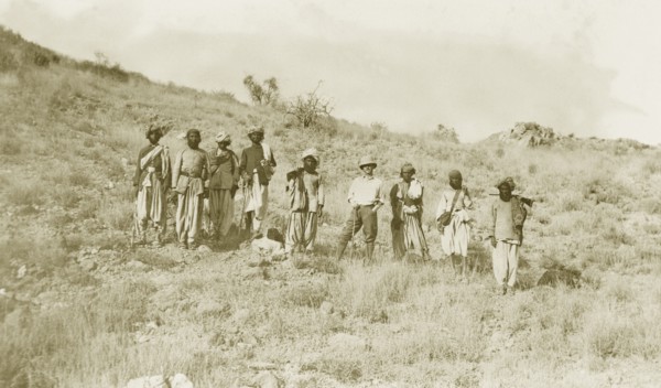 Walking sticks and a gun. Sir Henry Staveley Lawrence, Collector of Karachi, stands amongst a group