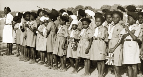 Brownies awaiting the arrival of Queen Elizabeth II. A pack of Nigerian Brownies stand in line