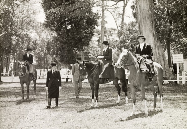 Siddle-saddle' class at Nairobi Show. Three ladies participating in the 'siddle-saddle' class at
