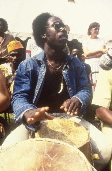 Drummer at the West African Music Village. A musician plays the drums at the West African Music