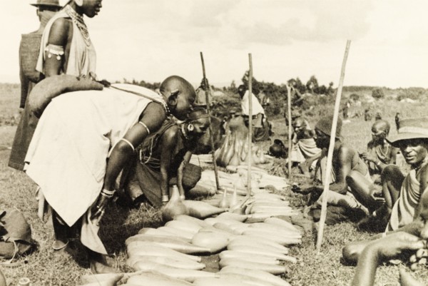 Gourd stall at Karatina market. Shoppers haggle with Kikuyu traders over slender, hollow gourds at