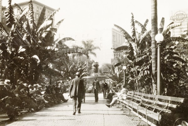 Pershing Square, Los Angeles. View along a tree-lined avenue leading to a decorative water fountain