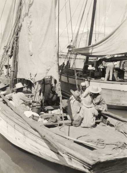 Boats moored at Port au Prince. Sailing boats are moored off shore at Port au Prince. Port au