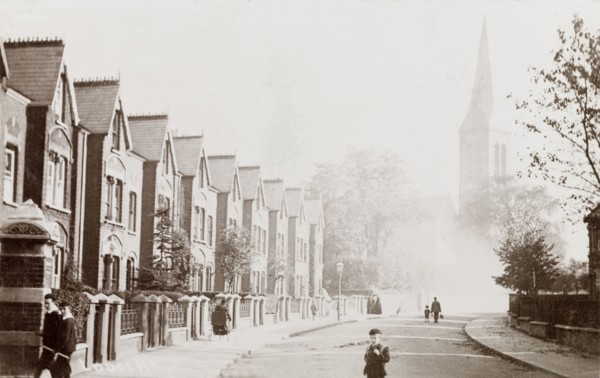 Lodge Road, West Croydon. View past a row of houses on Lodge Road in West Croydon, to the tall