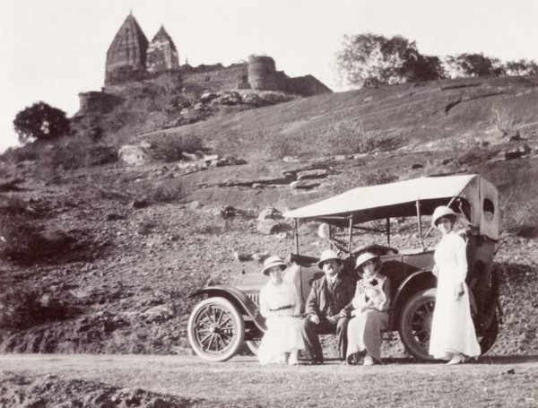 Road trip, India. James and Minnie Murray pose beside their parked motor car with two friends near