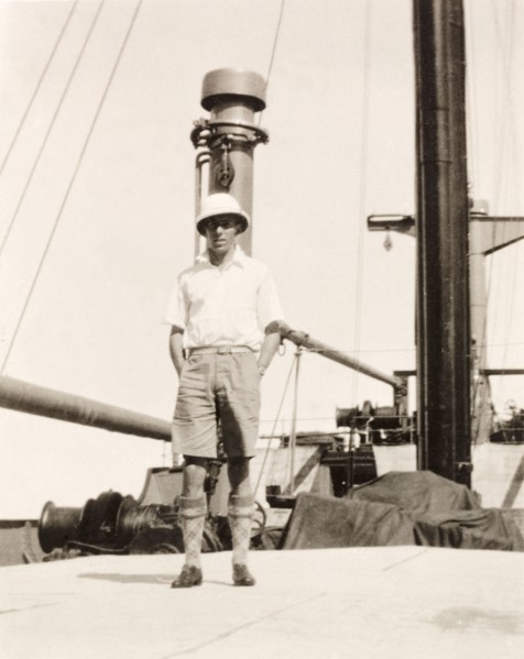 James Murray on deck of S.S. Domala. James Murray stands on the deck of the passenger liner S.S.