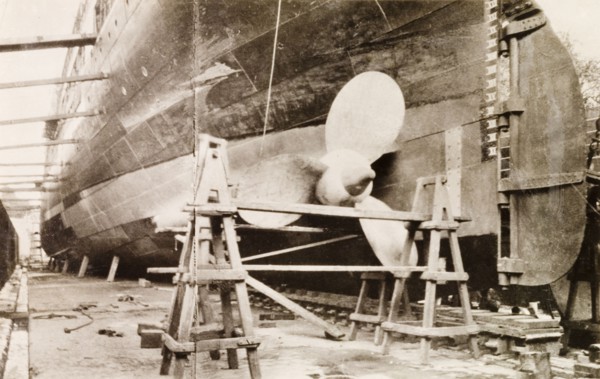 Ship at Kidderpore dry dock. View of a large ship dry-docked at Kidderpore dock, supported by a