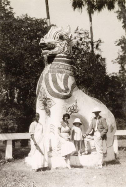 Sightseeing at the Shwe Dagon Pagoda. British tourists, accompanied by an Indian ayah (nursemaid),