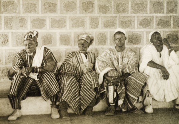 Ghanaian chiefs at a conclave. Four Ghanaian chiefs attend a conclave in traditional dress.