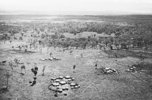 A Luo settlement on the Kano plains. Clusters of huts comprise a Luo settlement on the Kano plains,
