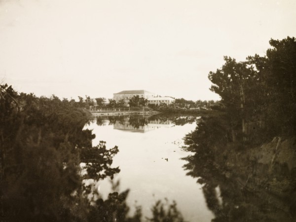 Canteen Lagoon', Bermuda. View across the still waters of an inland bay looking towards a large
