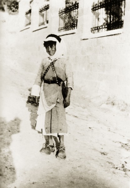Portrait of a Arab boy, Palestine. An Arab boy in traditional Palestinian dress poses for his