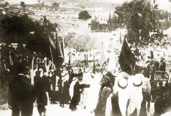 Nebi Musa procession in Ramallah. Muslim pilgrims bearing flags take part in a Nebi Musa