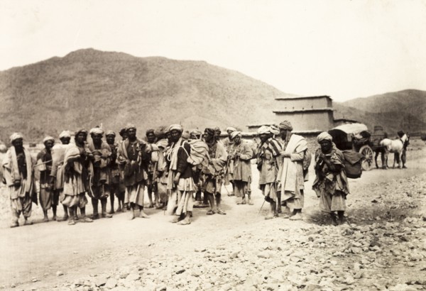Pashtun men on the Kohat-Peshawar road. A group of Pashtun men gathered on the Kohat to Peshawar