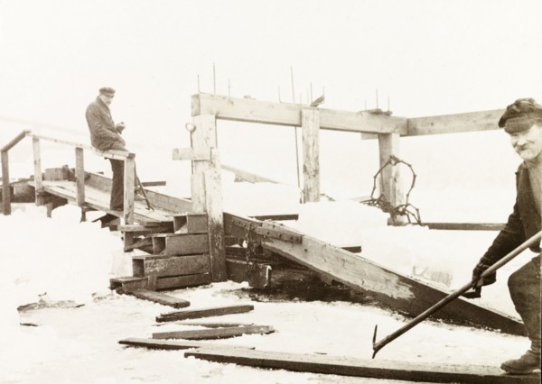 Ice cutters, Canada. Two ice cutters at work removing ice from Lake Ontario. Hamilton, Canada,