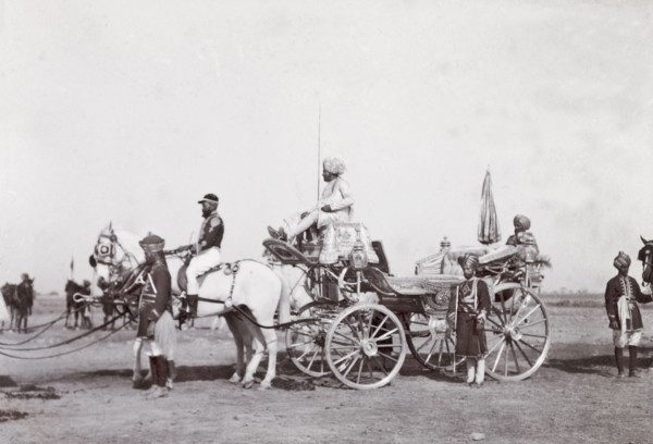 State carriage of Patiala, 1903. A team of white horses pull the ornate, silver state carriage of