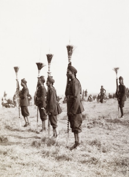 Spearmen at Coronation Durbar, 1903. Uniformed spearmen stand to attention holding ceremonial