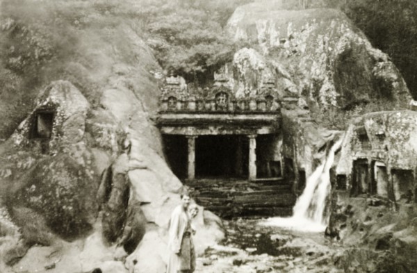 Kalhatti cave temple and waterfall. British colonists Reverend Norman Sargant and Mrs Wilson visit