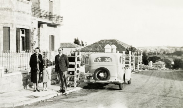 The Jones family in Jerusalem . The British Jones family stand on the pavement outside a house in