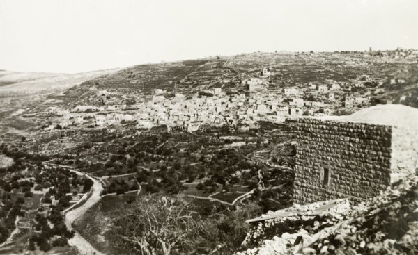 The village of Lifta, circa 1938. A twisting road winds its way down a hillside beneath the Arab