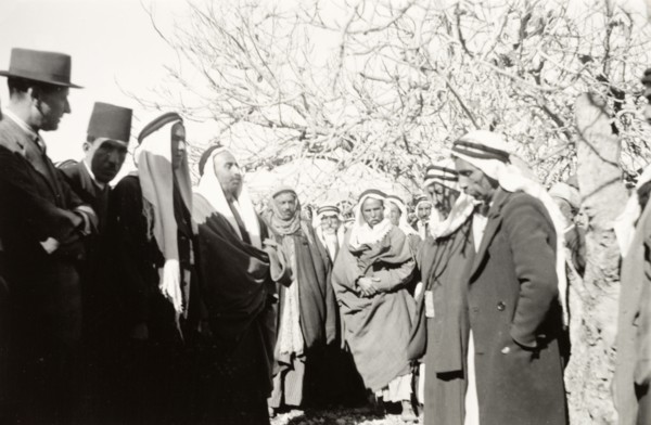 William Ryder McGeagh talks to Arab villagers. William Ryder McGeagh (left), District Commissioner