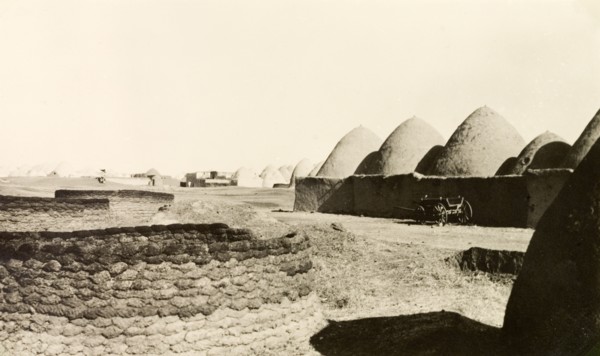 Bedouin mud dwellings near Aleppo. A Bedouin village near Aleppo, containing a number of