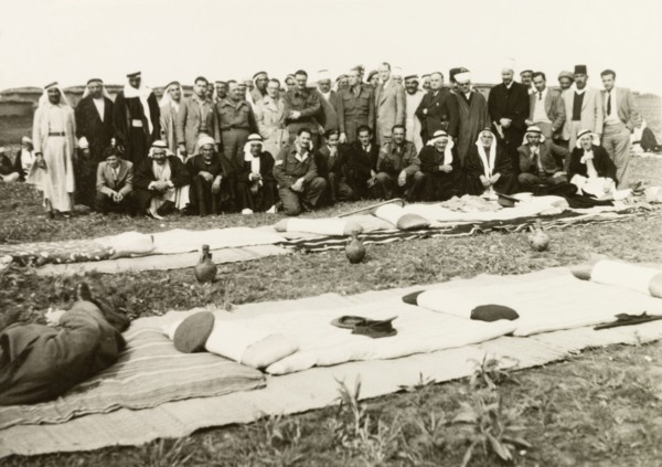 Recruitment meeting at Al Faluja. British colonial and military officers pose for a group portrait