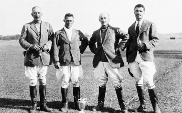 Winning polo players at Bareilly. Portrait of four male polo players after winning the Bareilly