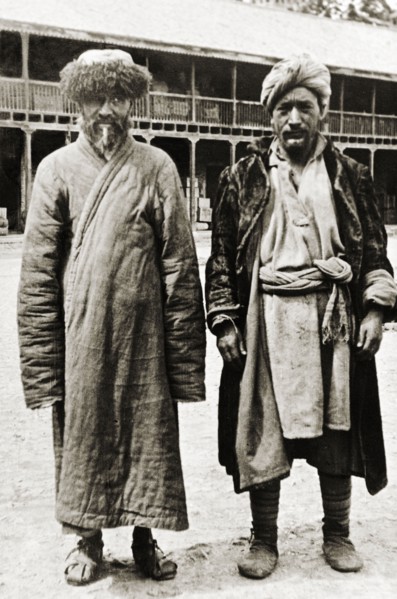 Kashmiri men from Srinagar. Full-length portrait of two Kashmiri men from Srinagar, dressed in