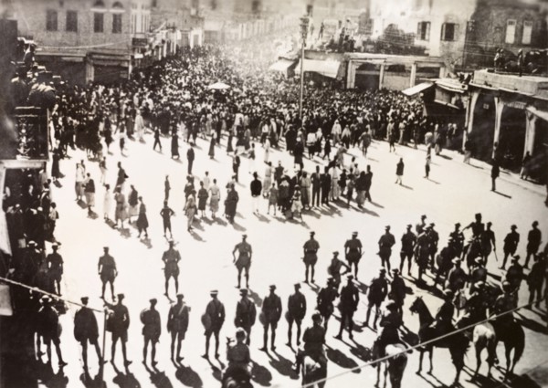 Troubles at Jaffa', 1938. British troops line a town square in Jaffa as an angry procession of