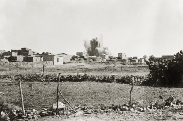 Demolition of a Palestinian house. An explosion rips through a Palestinian village as a house is