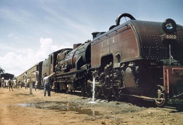East African Railways train on the Uganda Railway. Passengers board an East African Railways train