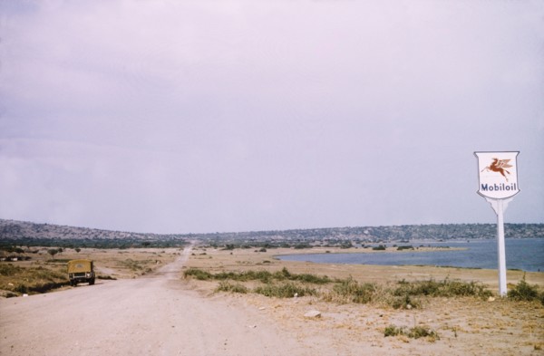 A rural road in Katwe. A Mobiloil sign stands beside a rural road in Katwe to Fort Portal, a