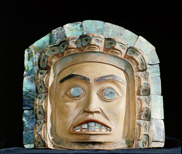 Chiefs frontlets with a human face surrounded by eleven smaller faces and an outer band of abalone shell