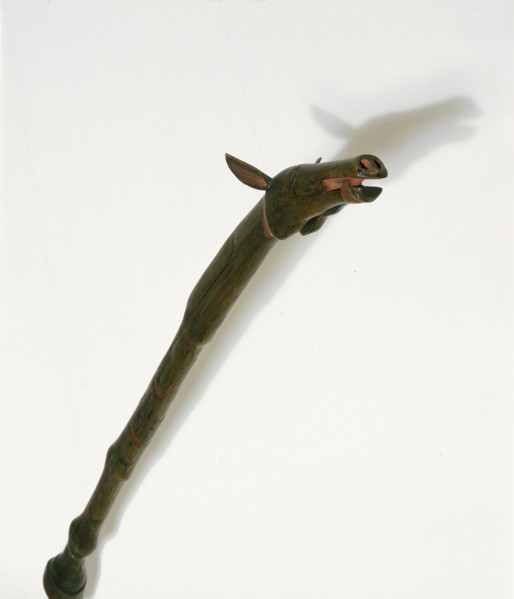 Horse dance stick carved by a warrior to honour his favourite horse killed in battle