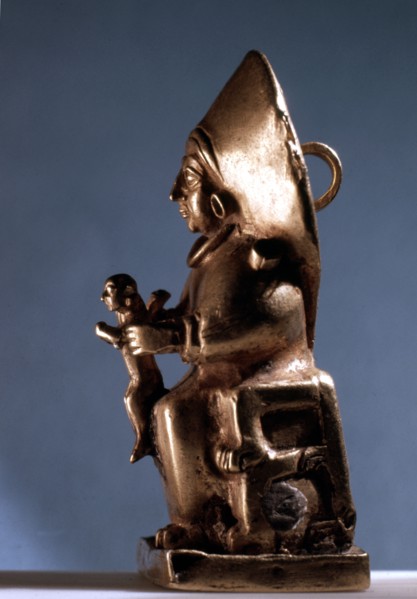 A pendant in the form of a seated goddess, probably representing the Sun Goddess of Arinna,Queen of the Land of Hatti, Queen of Heaven and Earth
