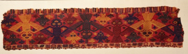 Border of a textile with humming birds