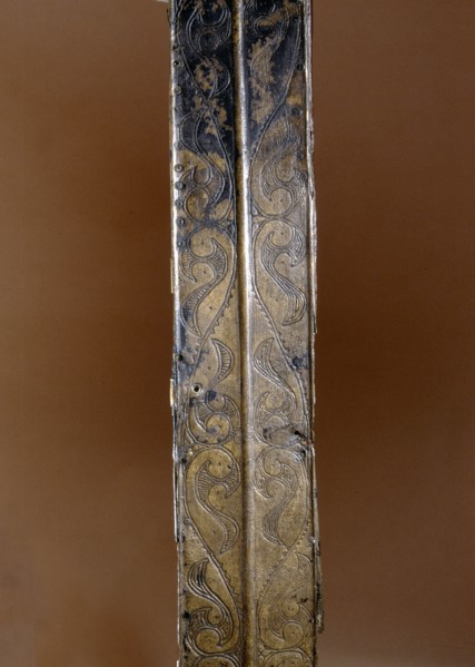 Detail of a bronze sword scabbard showing engraved decoration