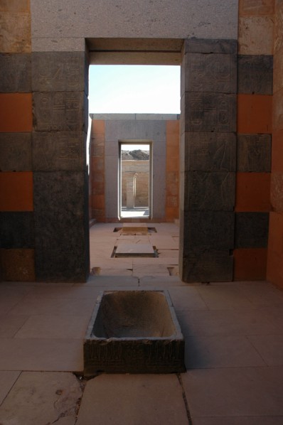 Interior view of the Red Chapel of Hatshepsut showing a granite lustral basin