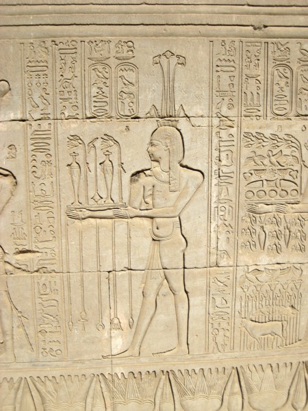 Carved relief on the outer wall of the structure which houses the Hall of the Ennead and The Sanctuary