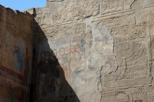 Wall reliefs from the period of Amenhotep III plastered over during Roman times with colourful images of Roman Emperors prior to the conversion into a Christian Chapel