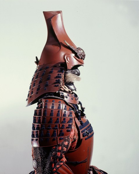 This suit of armour bears a Buddhist gold lacquer inscription on the breastplate