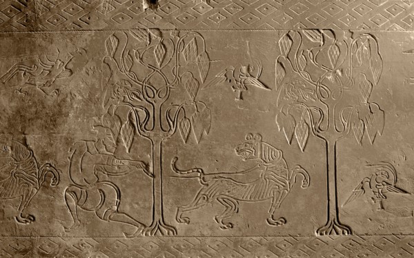 Brick from a tomb structure impressed with design of a man, tree, birds and a tiger