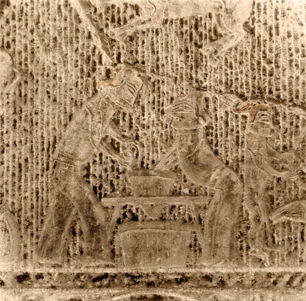 Brick from a tomb structure impressed with design depicting a kitchen scene
