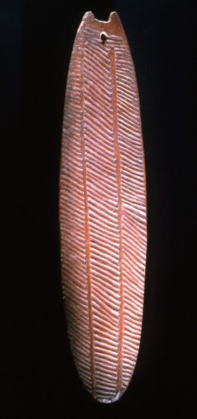 An incised wood sacred board from Western Australia