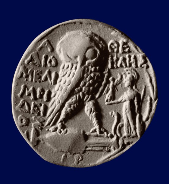Athenian four drachma (tetradrachm) coin with the symbols of the city, the owl and the statue of Athena Parthenos