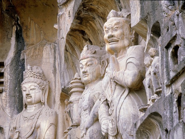 The Guardian kings of Buddhism carved on the north wall of the Fengxian temple at the Longmen cave temple complex