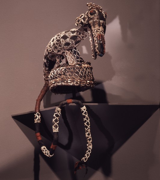 The headdress of a mask costume representing a leopard, a crucial symbol of kingship in the dance societies of the Bamileke